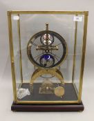 A moonphase skeleton clock. 53.5 cm high.