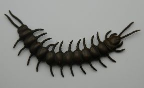 A Japanese bronze articulated model of a centipede. 16 cm long.