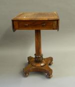 A William IV rosewood Pembroke side table. 73 cm wide flaps up.