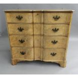 A mid-20th century walnut serpentine chest of drawers. 92 cm wide.
