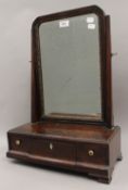 A Georgian mahogany toilet mirror. 37 cm wide.