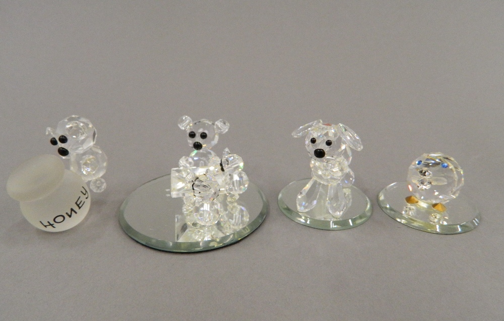 A collection of Swarovski figures in a display case - Image 11 of 11