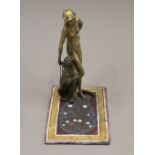 A cold painted bronze model of a girl and a leopard. 16.5 cm high.