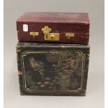 A wooden painted box and a small leather jewellery box. The former 25 cm wide.