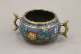 A Chinese cloisonne decorated bronze censer. 16 cm wide.