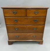 A 19th century mahogany chest of drawers. 97.5 cm wide.