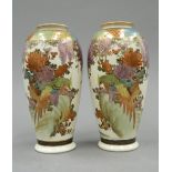 A pair of late 19th century Satsuma vases. Each 15.5 cm high.