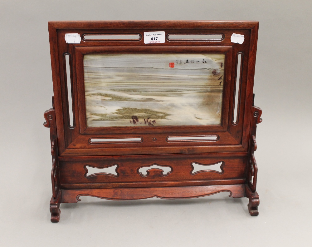 A Chinese dali marble dream stone screen in a hardwood frame. 38 cm high.