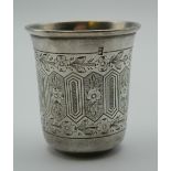 A small Russian silver beaker. 6 cm high.