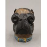 A cold painted bronze inkwell formed as a pug dog. 9 cm high.