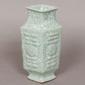 A Chinese, possibly 18th century, crackle glaze vase Of lozenge form, with all over celadon glaze.