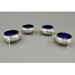 Four Victorian silver salts. 5.5 cm diameter (218.