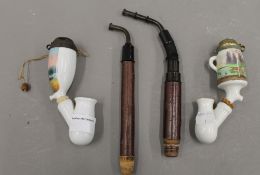 Two Bavarian porcelain pipes. The largest 26 cm high.