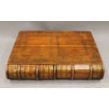 A large walnut handmade faux folio mahogany dummy book with two pull-out drawers. 40.5 cm wide.