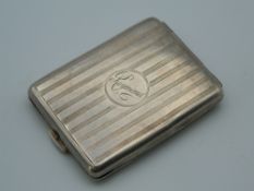 A small hallmarked silver match case. 6 cm high (26 grammes).