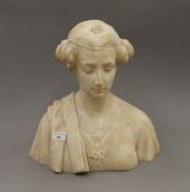 An alabaster bust of a classical woman. 38 cm high.