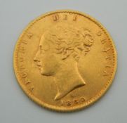 An 1860 Victoria young head half sovereign
