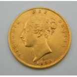 An 1860 Victoria young head half sovereign