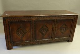 An 18th century style coffer. 146 cm wide.