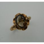 A 9 ct gold citrine ring. Ring Size M (2.