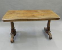 An early 19th century rosewood library table. 134 cm long.