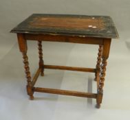 A Victorian carved oak barley twist side table. 76.5 cm wide.