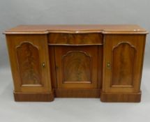 A Victorian mahogany breakfront sideboard. 156 cm wide.