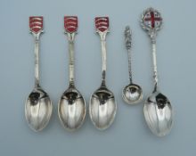 Four silver and enamel spoons (60 grammes), together with another.