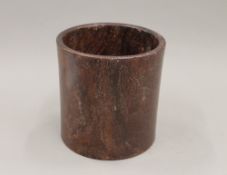 A Chinese wooden brush pot. 17.5 cm high.