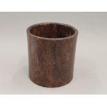 A Chinese wooden brush pot. 17.5 cm high.