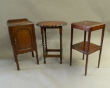 A walnut pot cupboard, an oak barley twist side table and a mahogany nightstand.