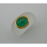 A jade set dress ring.