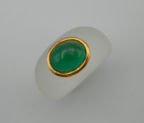 A jade set dress ring.