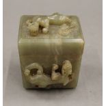 A jade box with dogs-of-fo. 9 cm high.