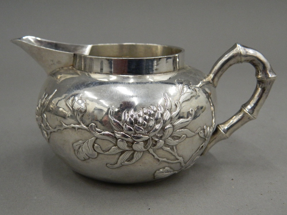 A Chinese silver three piece tea set, - Image 11 of 13