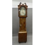 A 19th century oak and mahogany eight-day longcase clock, the dial inscribed ''Geo.