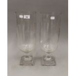 A pair of cut glass storm lamps. 40.5 cm high.