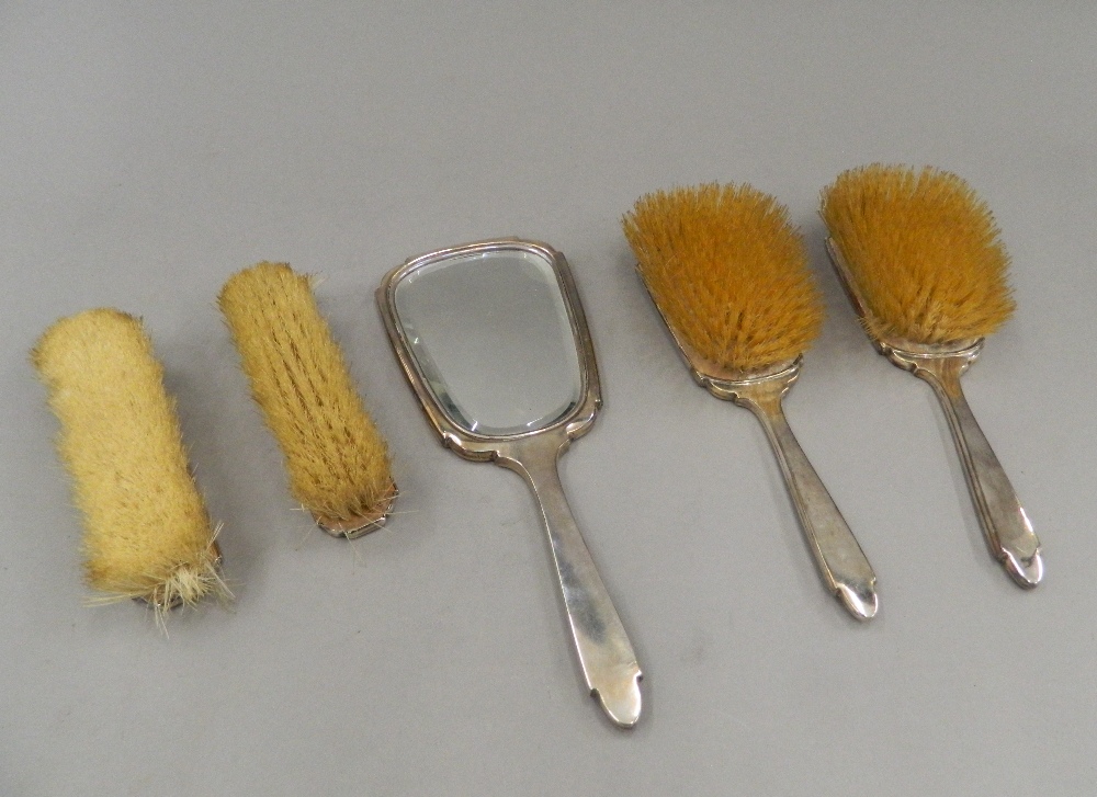 A cased silver and tortoiseshell dressing set (lacking comb). The case 34 cm wide. - Image 4 of 13