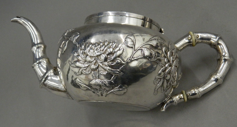 A Chinese silver three piece tea set, - Image 6 of 13