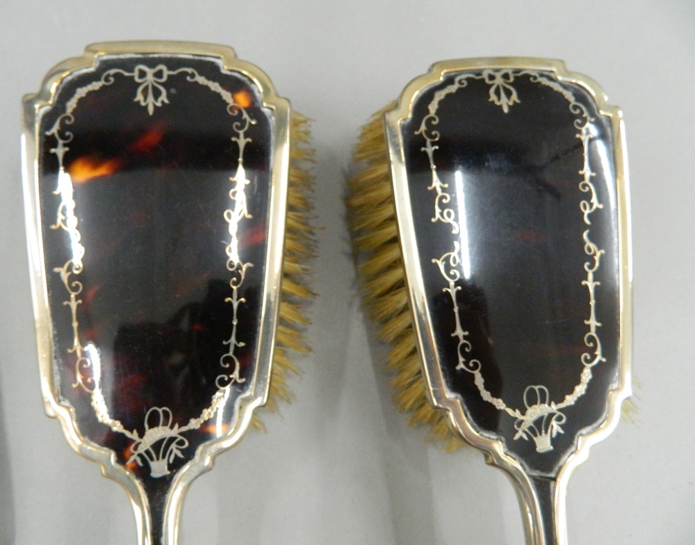 A cased silver and tortoiseshell dressing set (lacking comb). The case 34 cm wide. - Image 5 of 13