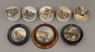 A collection of Victorian Prattware pot lids and pots.