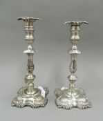 A pair of early 20th century silver candlesticks.