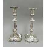 A pair of early 20th century silver candlesticks.