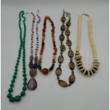 A quantity of various bead necklaces