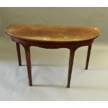 A 19th century mahogany demi-lune side table. 126 cm wide.