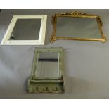 A gilt framed mirror and two other mirrors. The former 97 cm wide.