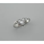 A silver cubic zirconia heart ring. Ring Size O.