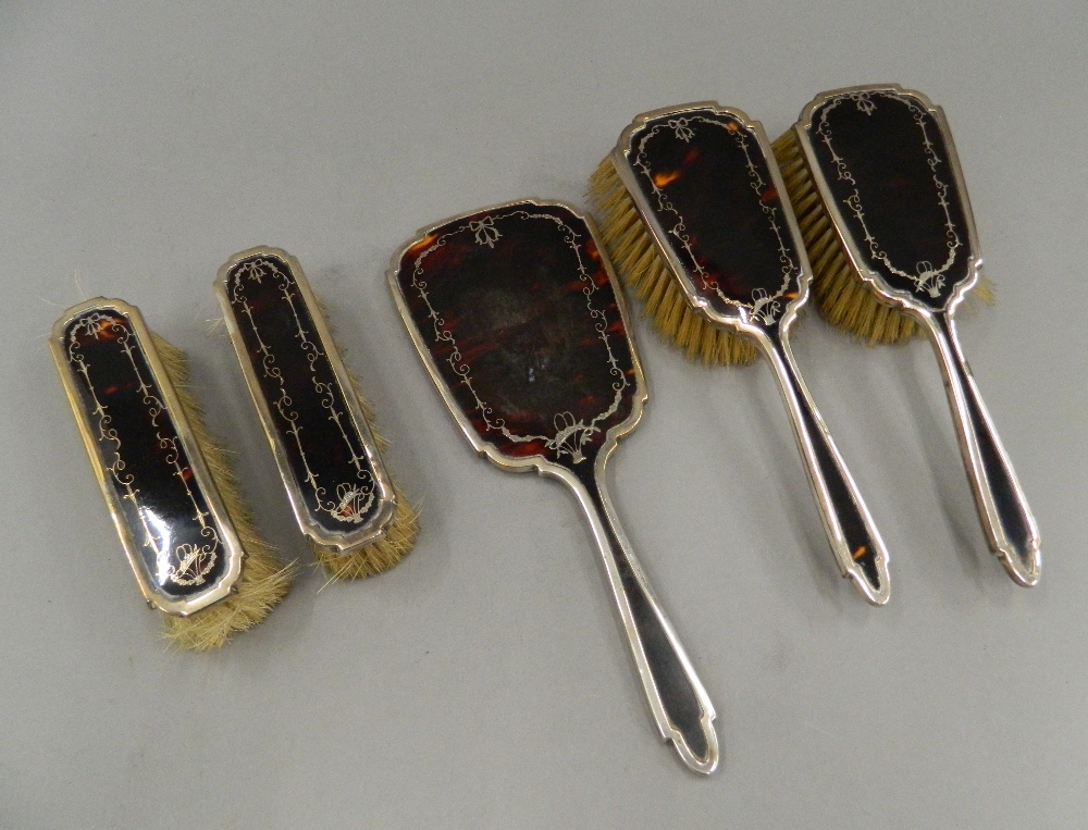 A cased silver and tortoiseshell dressing set (lacking comb). The case 34 cm wide. - Image 3 of 13