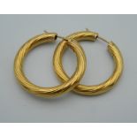 A pair of 9 ct gold hoop earrings. (7.