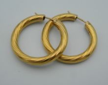 A pair of 9 ct gold hoop earrings. (7.